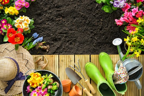 Back garden landscaping in Ponders End with patio and lawn design